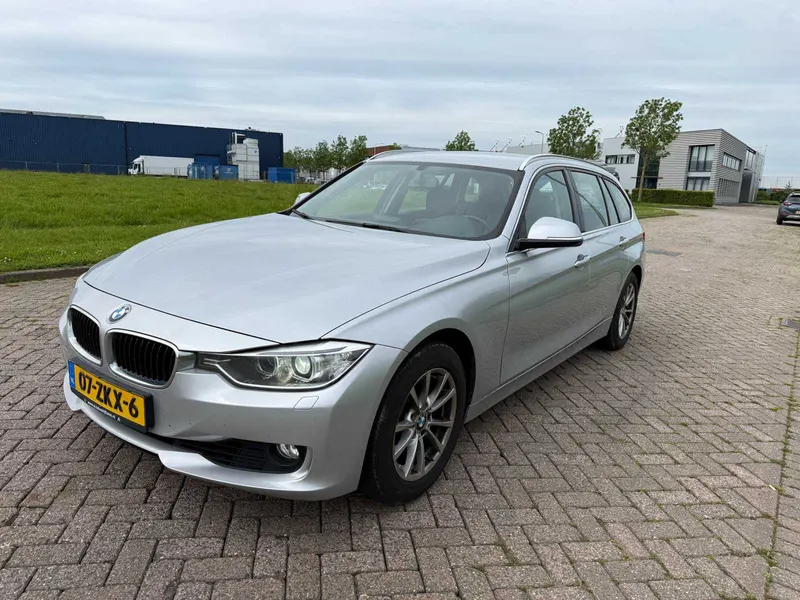 BMW 3-serie Touring 320i High Executive 2013